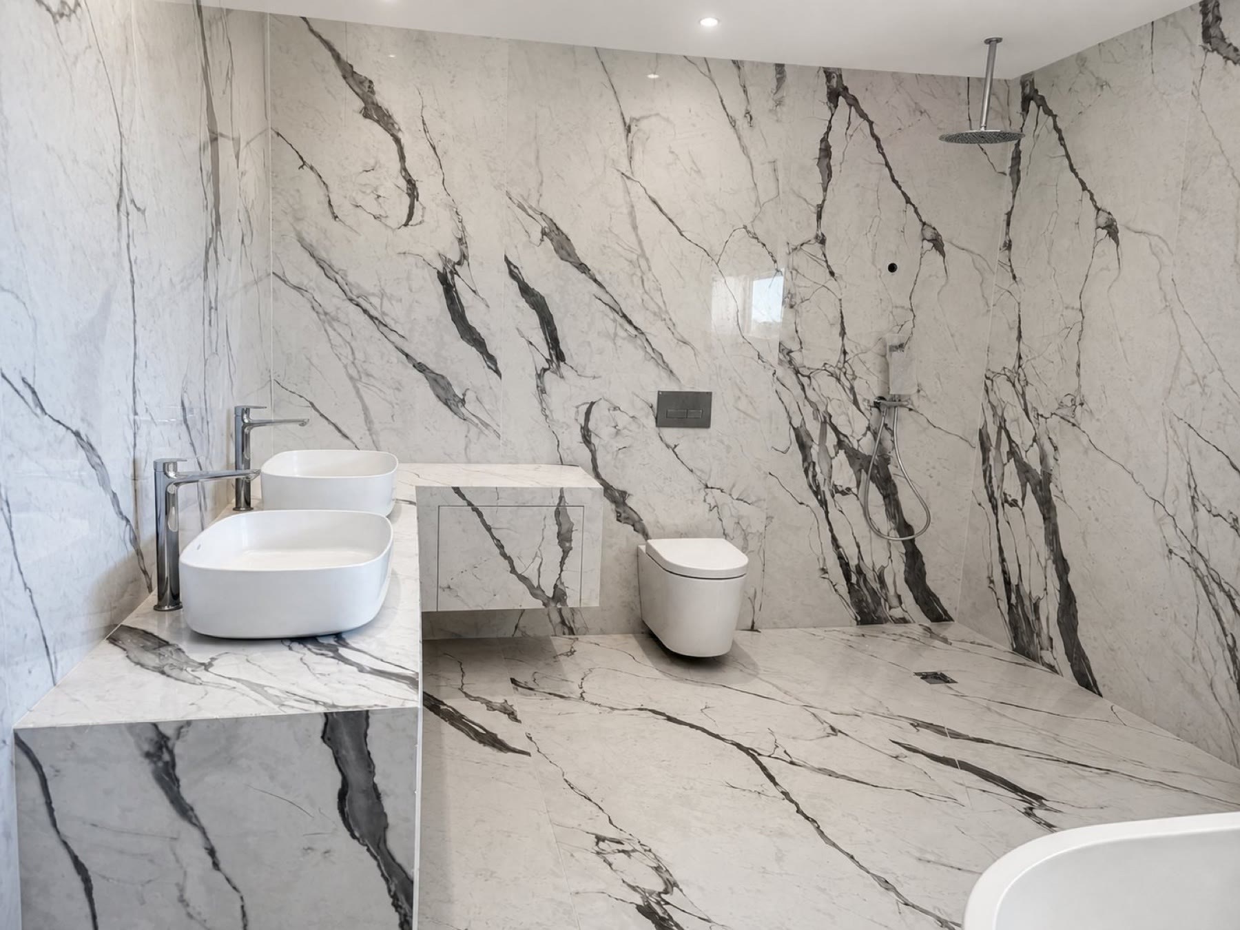 Complete bathroom renovations by Elya Tiling Group
